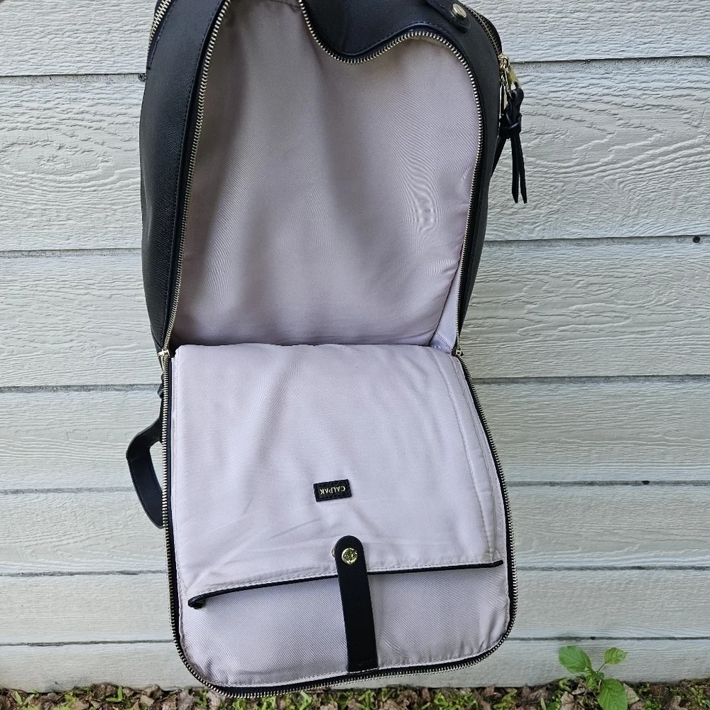 Calpak Kaya black faux leather laptop travel backpack